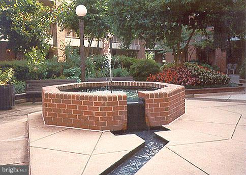 1951 Sagewood Lane, Unit 214 Reston, VA 20191 - Photo 17 of 23 a outdoor space with lots of green space