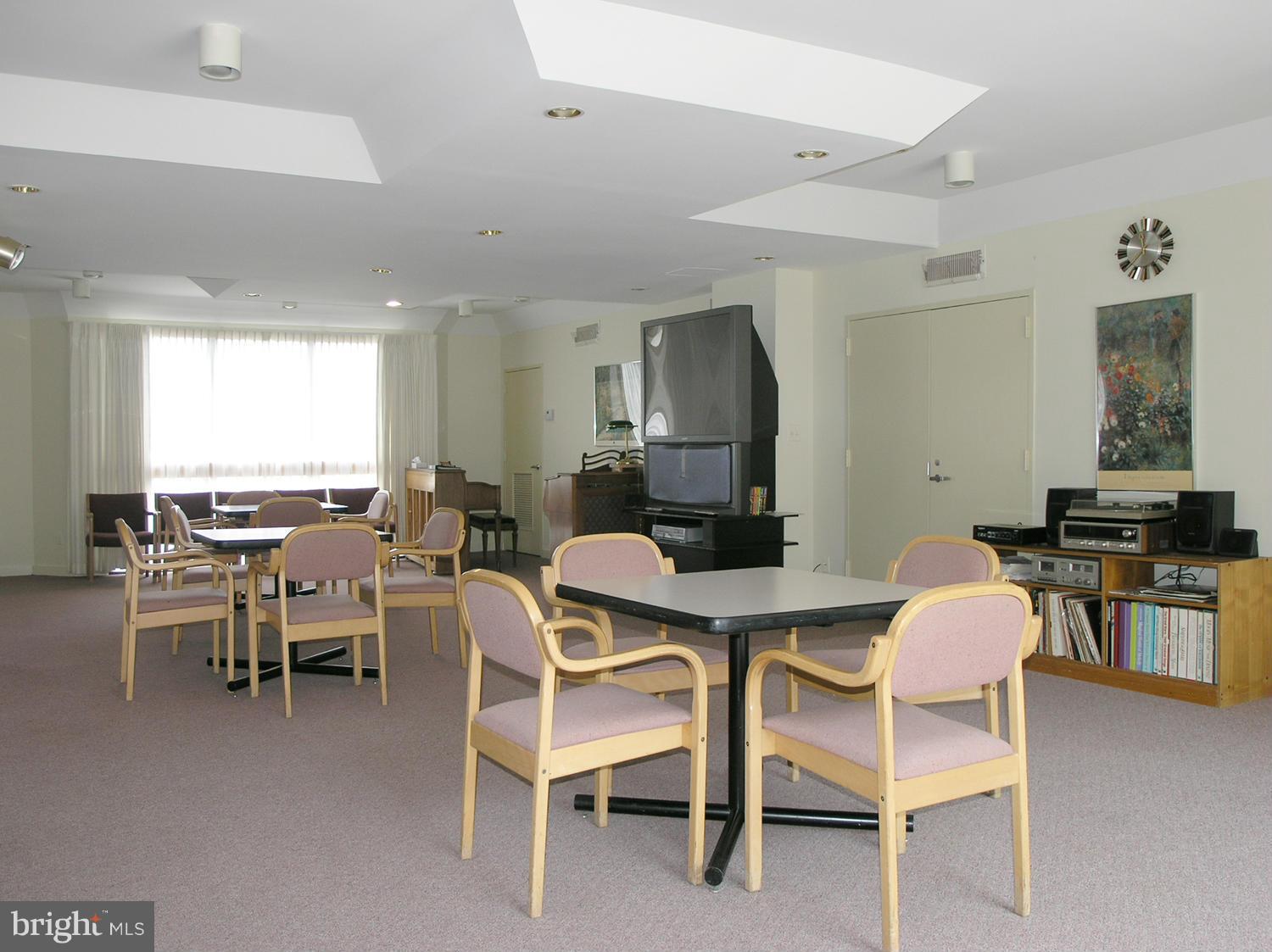 1951 Sagewood Lane, Unit 214 Reston, VA 20191 - Photo 19 of 23 a view of a dining room with furniture