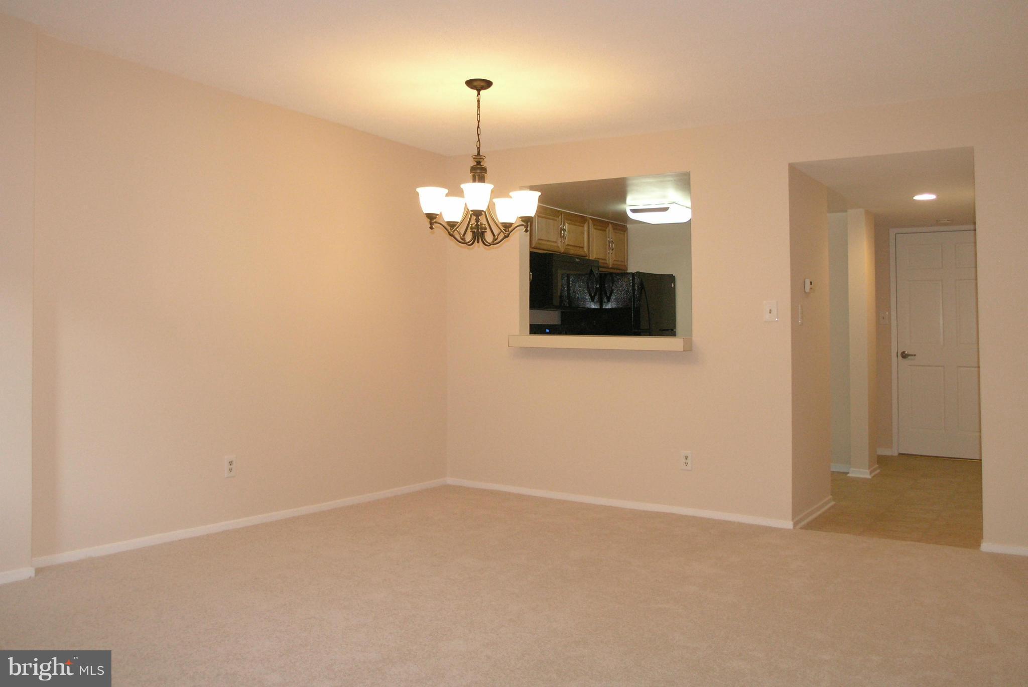 1951 Sagewood Lane, Unit 214 Reston, VA 20191 - Photo 6 of 23 an empty room with a bathroom