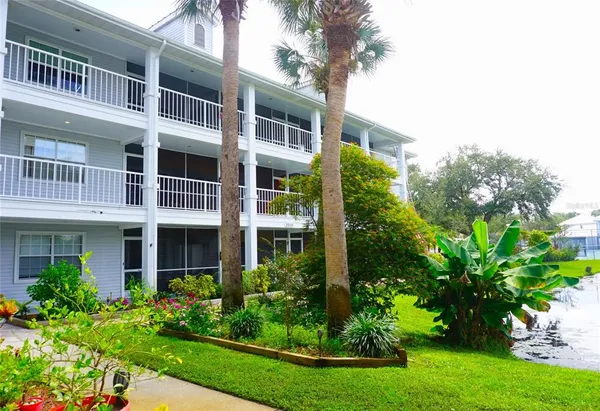 a view of a building with a garden