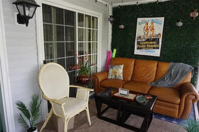 a blue chair sitting next to a blue wall and chair