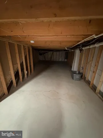 a view of a house with a yard and garage