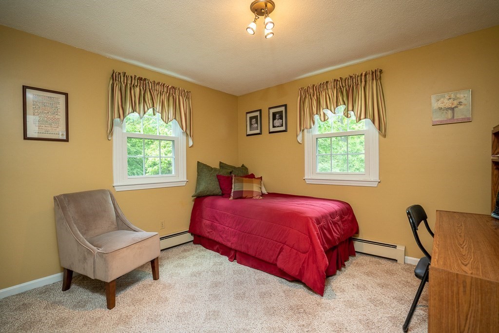 162 West Autumn Road West Springfield, MA 01089 - Photo 18 of 41 a bed room with a bed and a chair