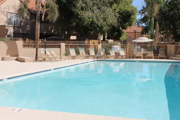 a view of a house with a swimming pool
