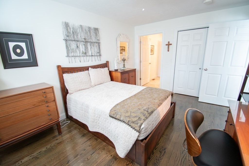 26 Mark Circle, Unit 26 Rutland, MA 01543 - Photo 8 of 26 a bedroom with a bed and furniture