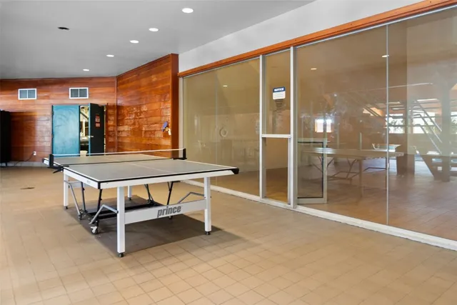 a dinning table and chairs in a room