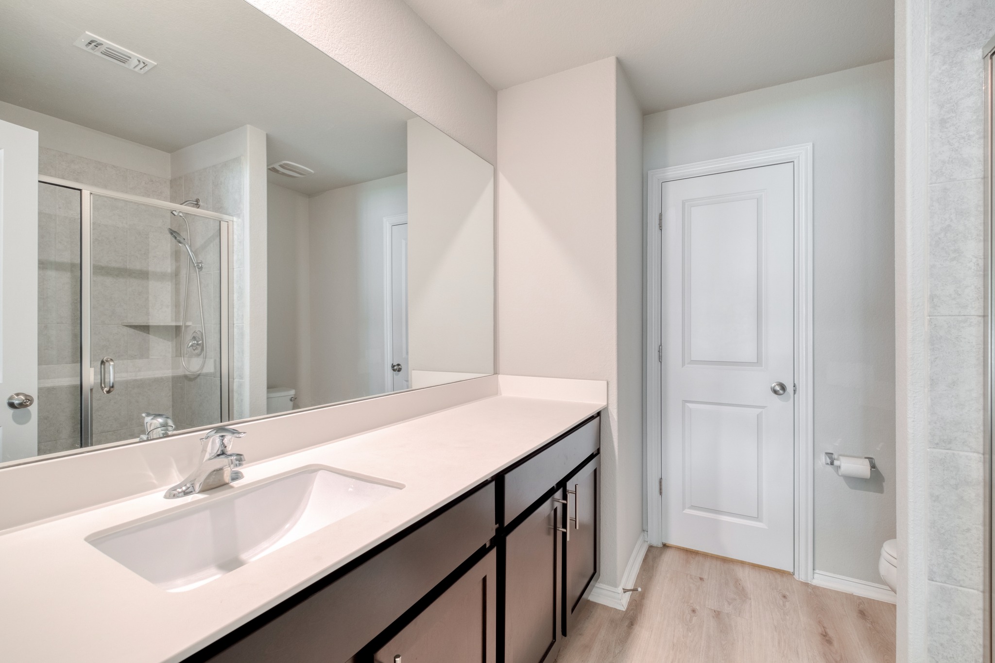1000 Bright Star Cove Georgetown, TX 78628 - Photo 24 of 40 a bathroom with a sink and a mirror