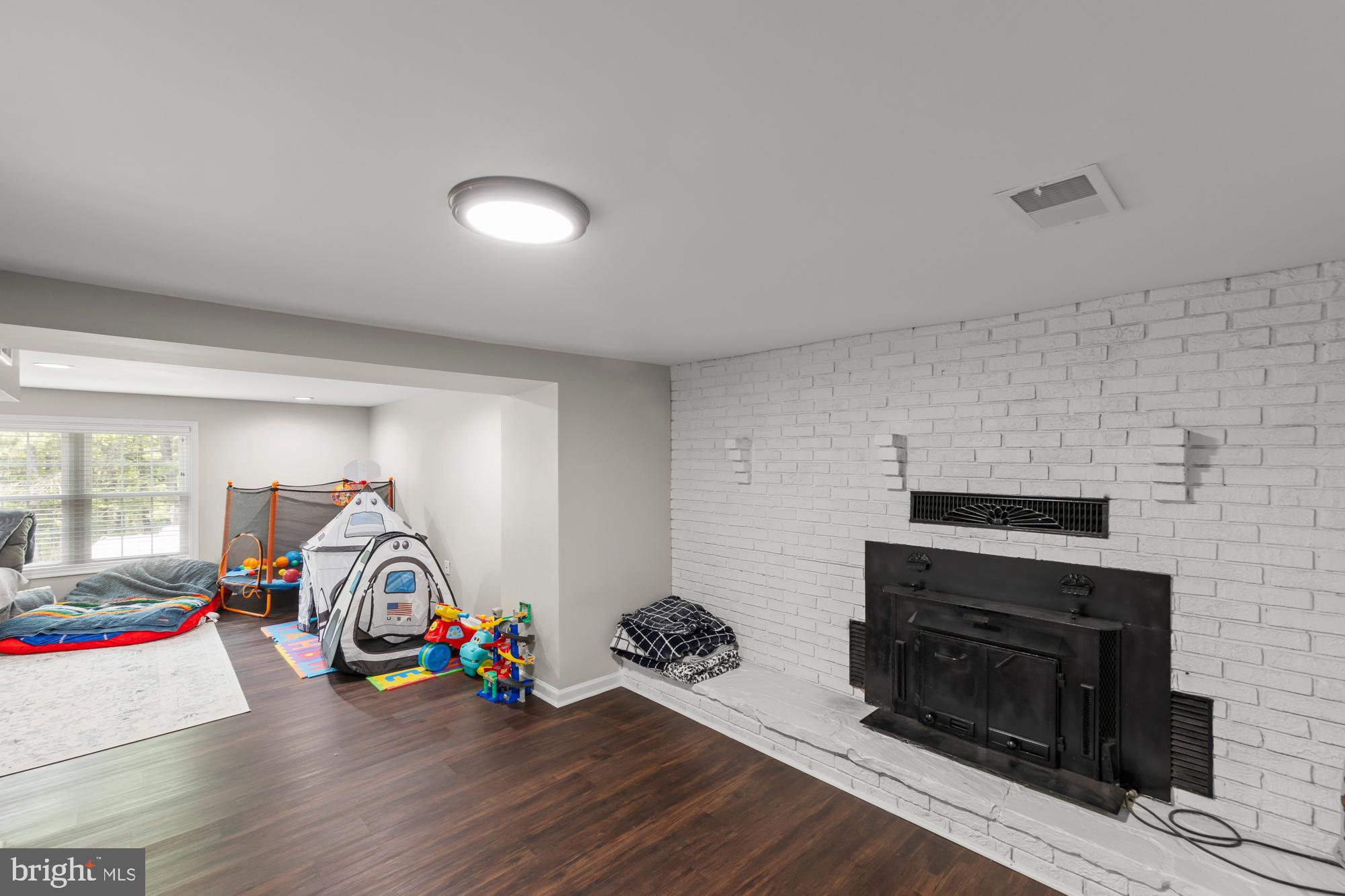 357 Hunting Ridge Road Winchester, VA 22603 - Photo 33 of 54 Lower level recreation room/wood burning fireplace