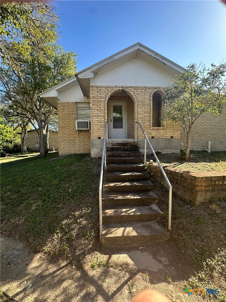 137 Farm To Market Road 774 Refugio, TX 78377 - Photo 33 of 42 a front view of a house with a yard