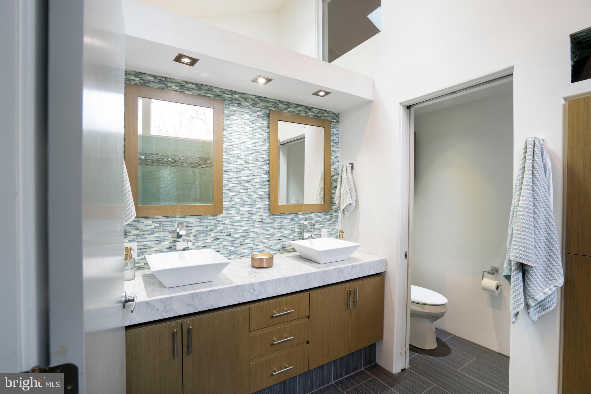 854 Thomas Street State College, PA 16803 - Photo 44 of 82 a bathroom with a sink and a mirror