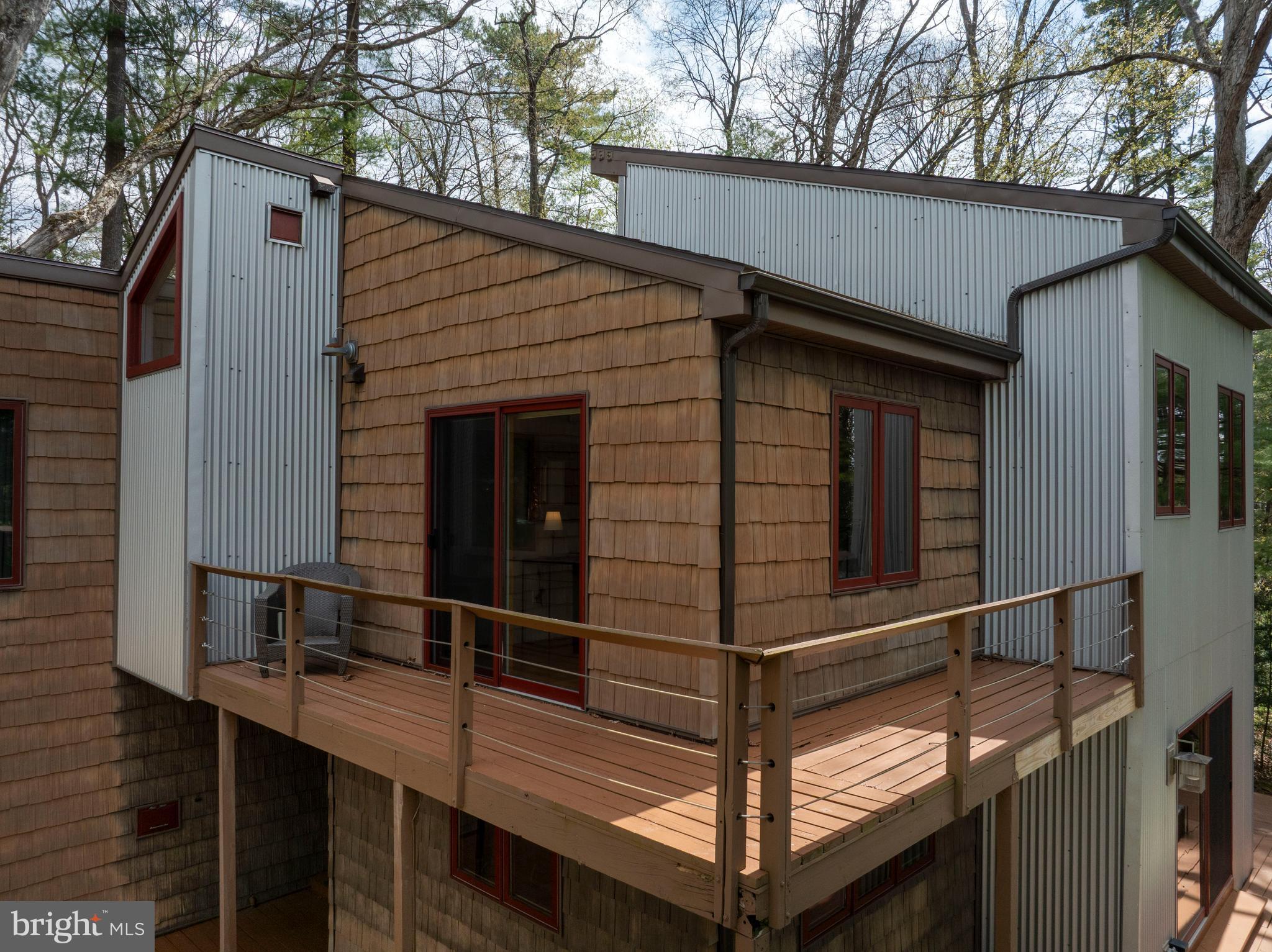 854 Thomas Street State College, PA 16803 - Photo 61 of 82 a view of house with wooden fence and a large tree