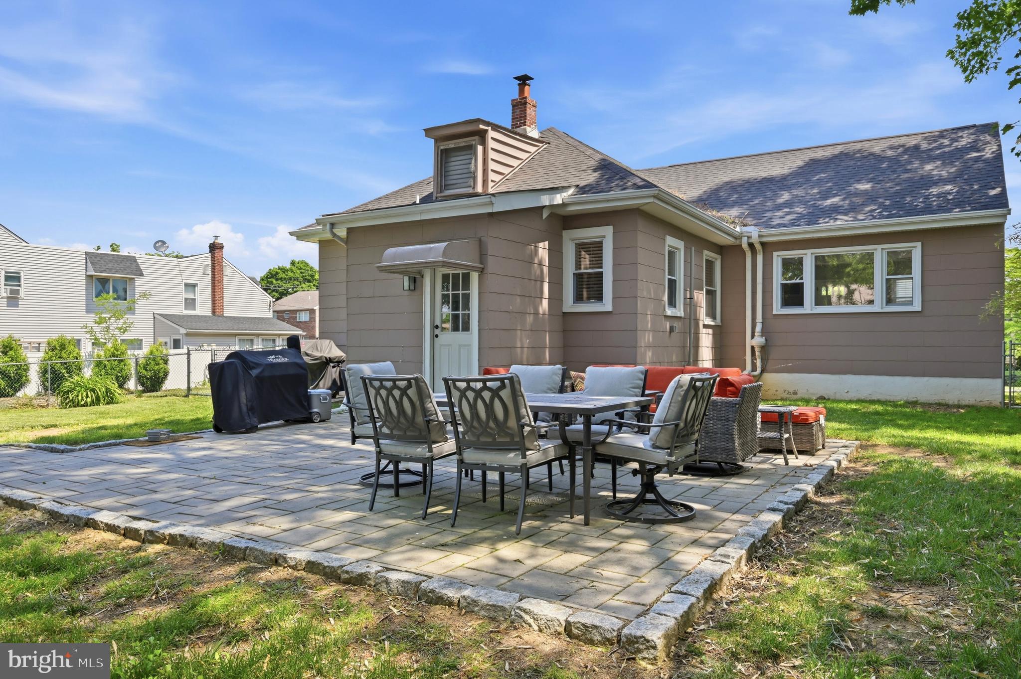 211 North Sylvania Avenue Jenkintown, PA 19046 - Photo 14 of 17 a view of a dinning table and chairs in patio