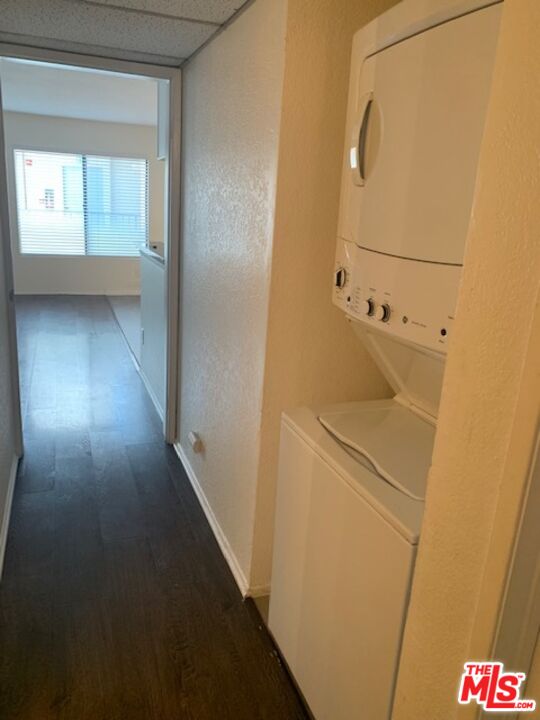 4353 Coldwater Canyon Avenue, Unit 305 Studio City, CA 91604 - Photo 7 of 27 a utility room with closet and wooden floor