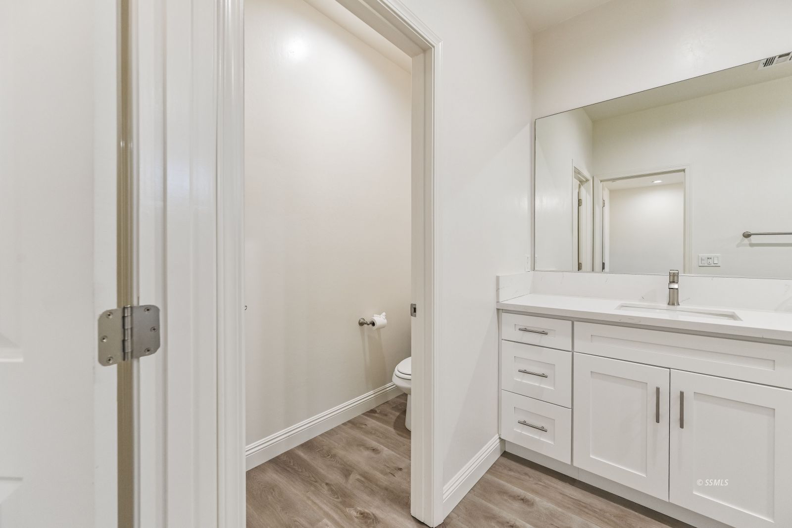 1031 West Church Avenue Ridgecrest, CA 93555 - Photo 29 of 49 a bathroom with a sink a toilet and shower