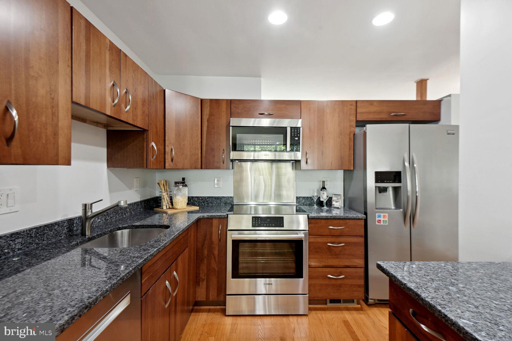 345 O Street Southwest Washington, DC 20024 - Photo 9 of 46 Stainless steel appliances and granite countertop