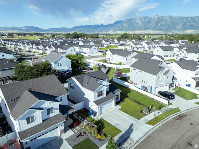 1486 West 2055th Street South Logan, UT 84339 - Photo 42 of 45 Expansive neighborhood featuring a consistent architectural style, mature mountain scenery, and well-maintained streetscapes