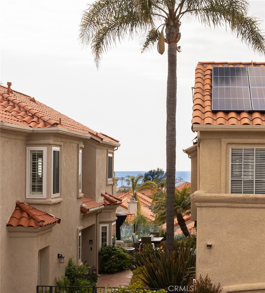 20 St Michael Dana Point, CA 92629 - Photo 20 of 43 a front view of a house with a garden