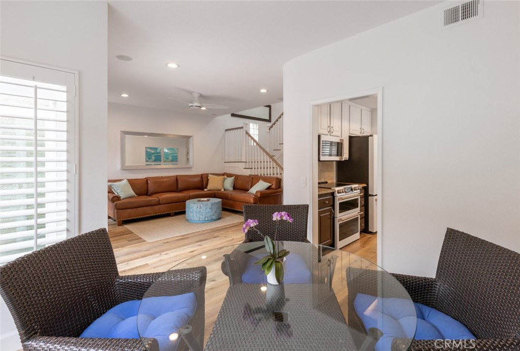 20 St Michael Dana Point, CA 92629 - Photo 9 of 43 a living room with furniture windows and a flat screen tv
