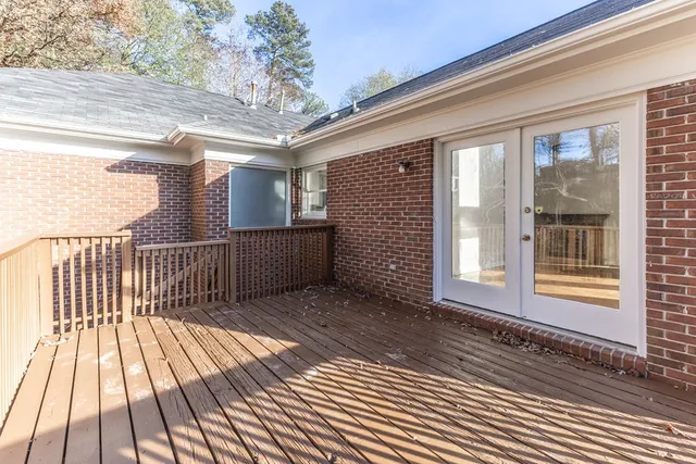 a view of a barn in the middle of a yard