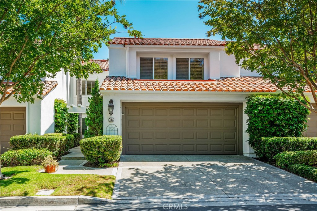 15 Alejo, Unit 61 Irvine, CA 92612 - Photo 1 of 1 a front view of a house with yard