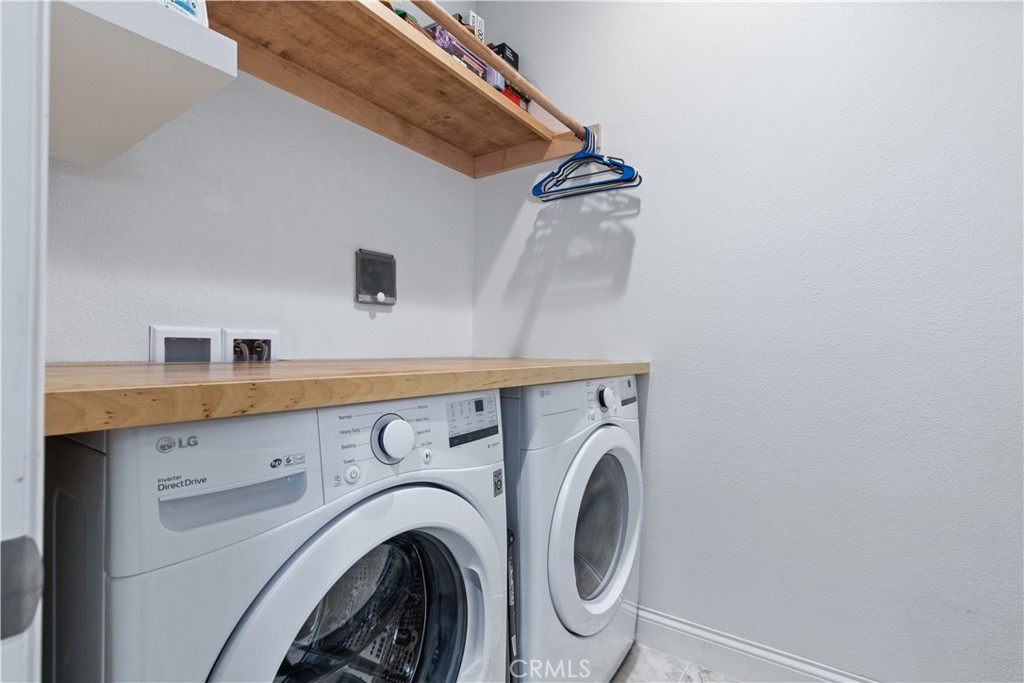 9354 Riberena Circle Atascadero, CA 93422 - Photo 28 of 47 a utility room with dryer and washer