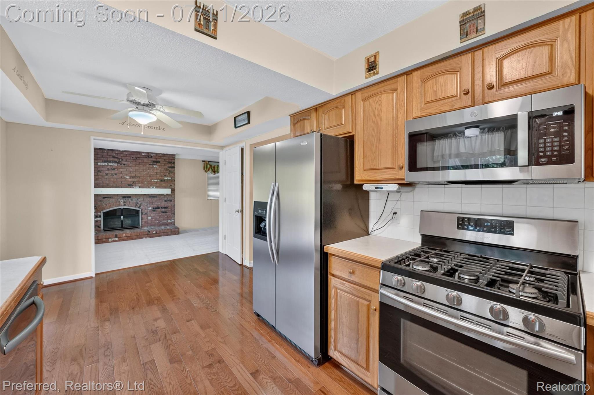 46596 Maidstone Road Canton, MI 48187 - Photo 15 of 61 Kitchen featuring Hard wood flooring