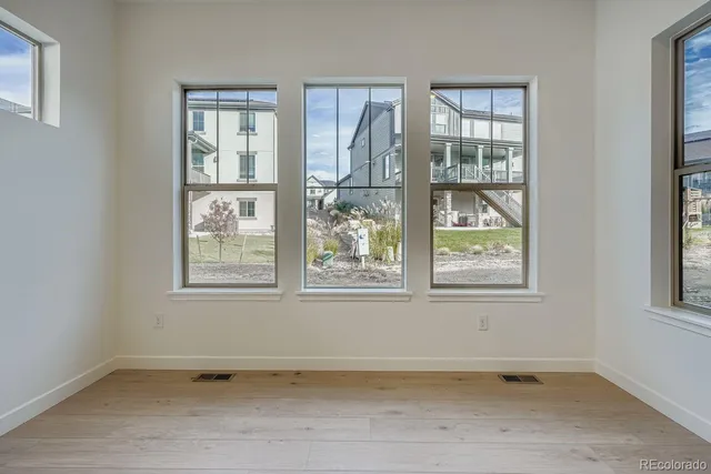 an empty room with windows