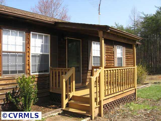 645 Barnaby Road Palmyra, VA 22963 - Photo 10 of 10 a front view of a house with a porch