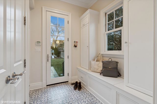 a room with window and furniture