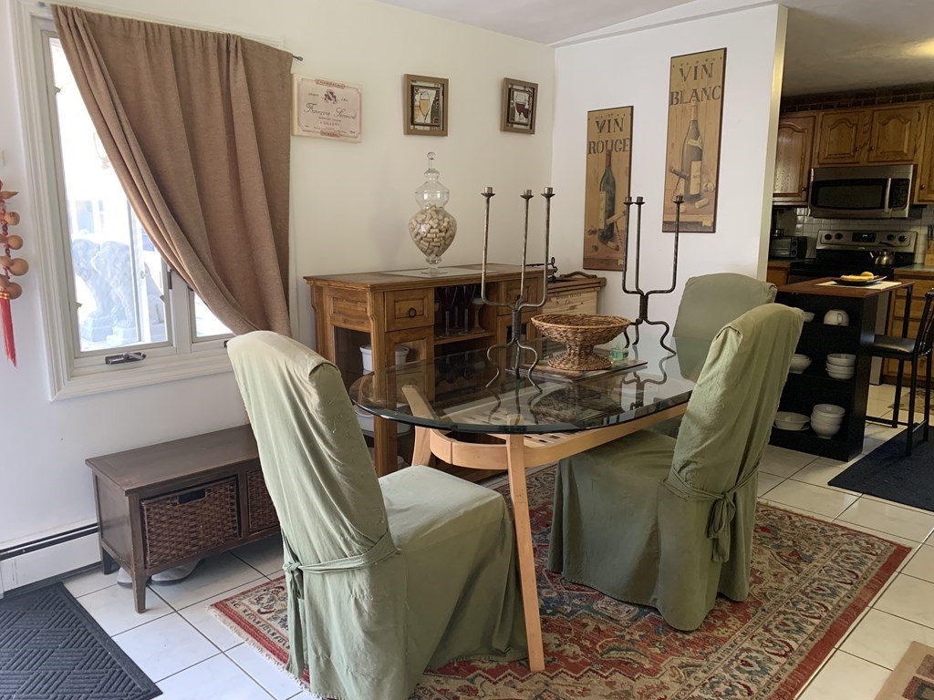 60 Gregory Road Framingham, MA 01701 - Photo 6 of 14 a view of a dining room with furniture