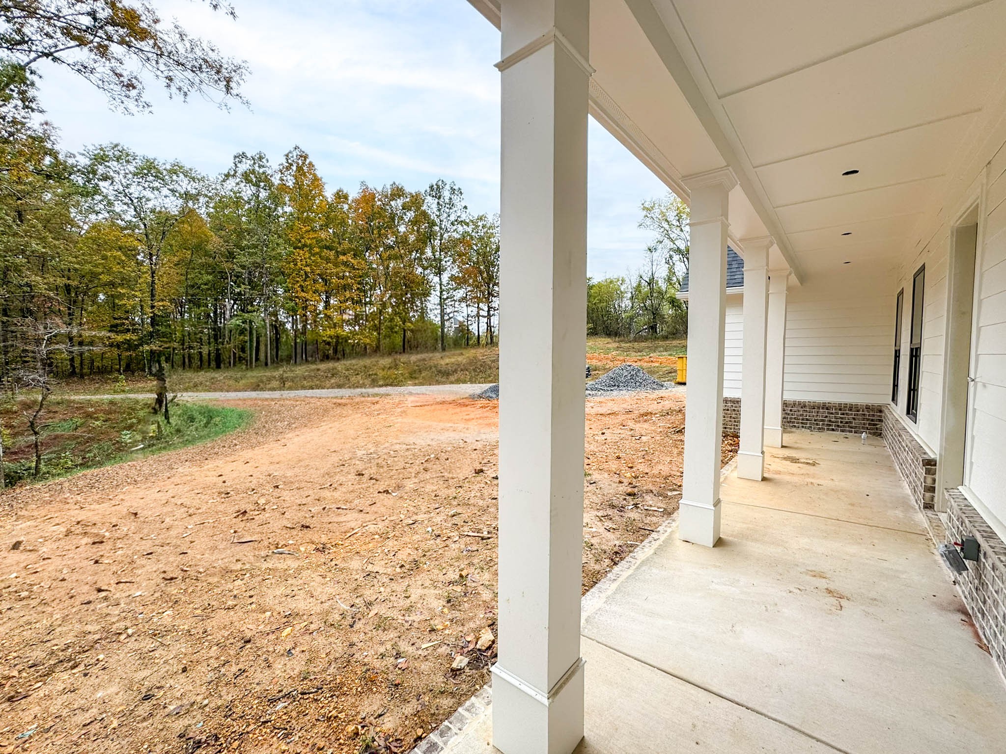 0 Barnhill Road Primm Springs, TN 38476 - Photo 14 of 38 a view of a porch with a floor to ceiling window wooden floor and a yard