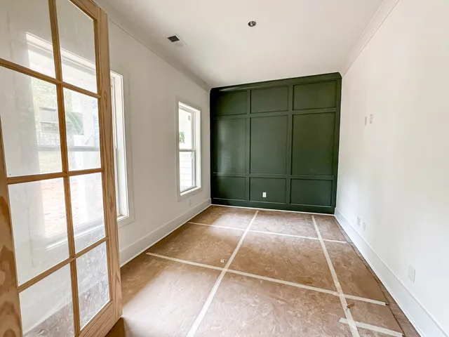 a room with a black gate