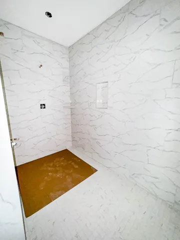 a room with a black white checkered floor