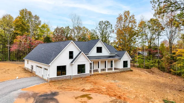 a house with trees in the background
