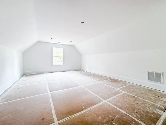 a view of a room with windows