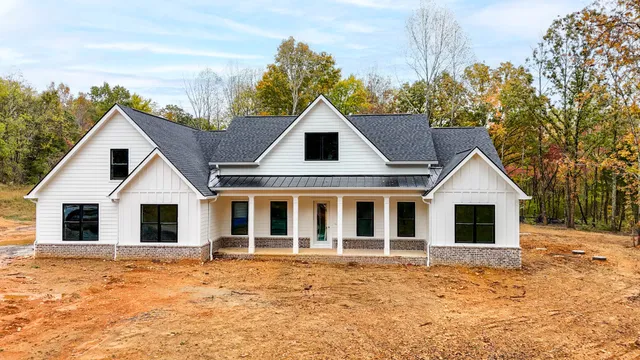 a front view of house with yard