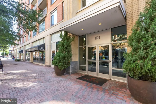 a front view of a building with garden