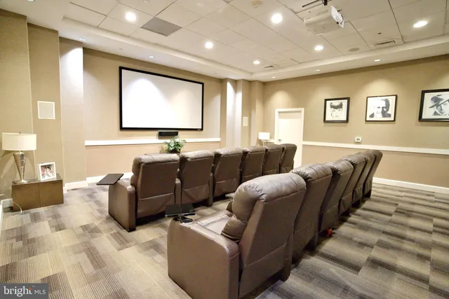 a living room with furniture and a large mirror
