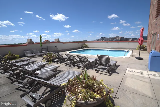 a view of wooden staircase with white walls