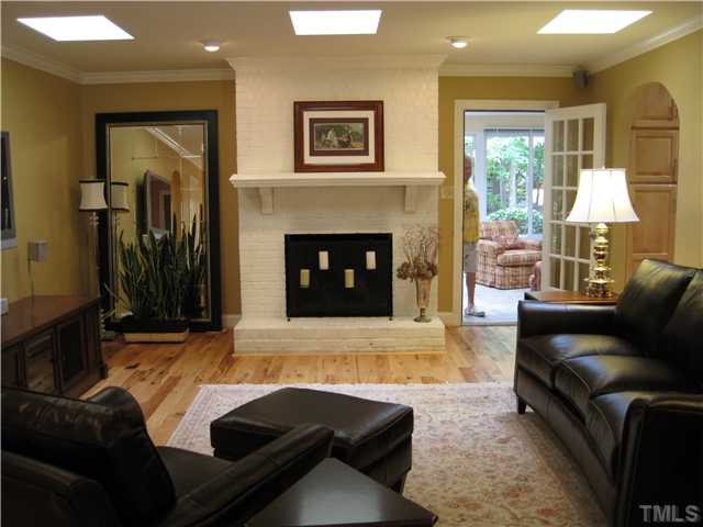 8813 Brandon Station Road Raleigh, NC 27613 - Photo 4 of 18 Large Living Room with Masonry Fireplace. Use the remote gas log or real wood! Living Room