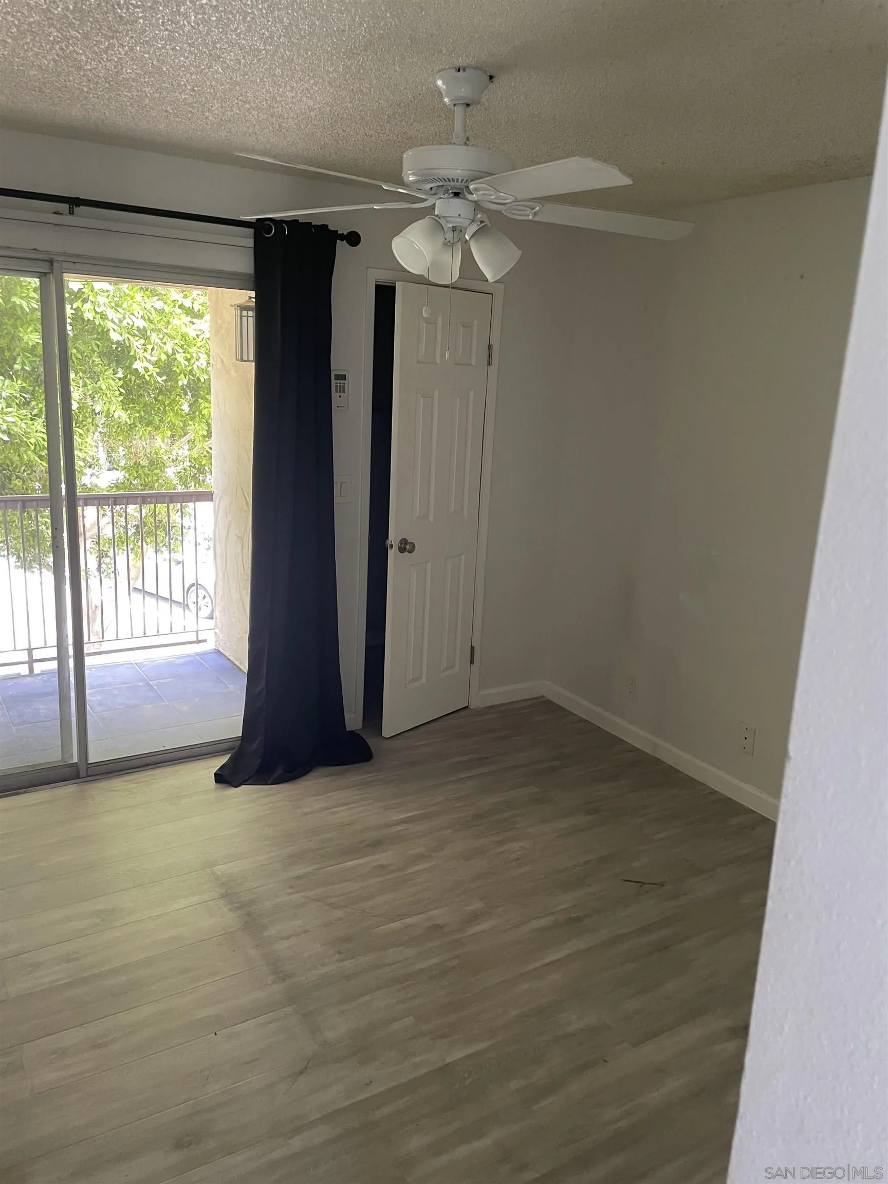 64281 Spyglass Avenue, Unit 42 Desert Hot Springs, CA 92240 - Photo 4 of 19 a view of an empty room with a window