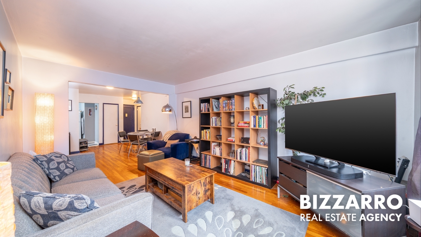 Undisclosed Address Manhattan, NY 10040 - Photo 3 of 14 a living room with furniture and a flat screen tv