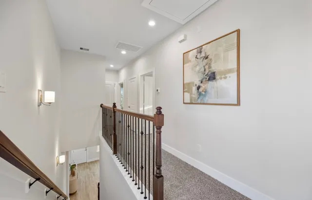 a view of entryway with wooden floor