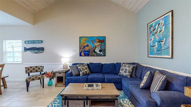 a living room with furniture and a couch