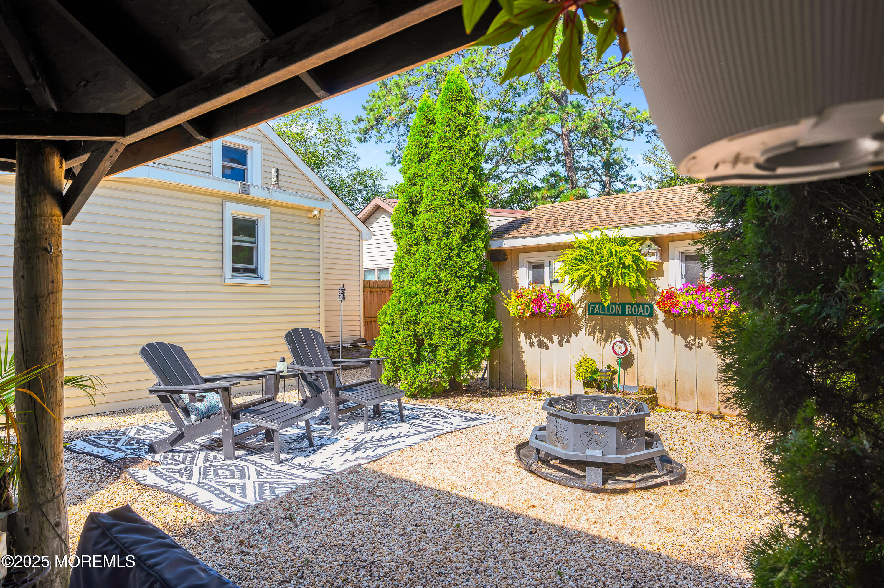 13 Liverpool Road Brick, NJ 08723 - Photo 8 of 51 a view of a patio with table and chairs and potted plants