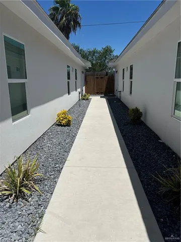 a backyard of a house with lots of green space
