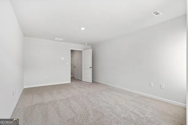 an empty room with an entryway