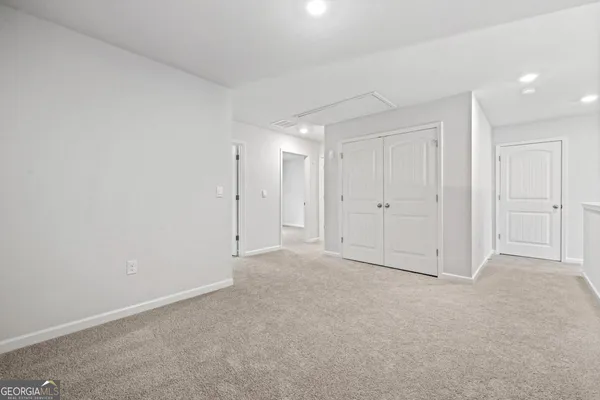 an empty room with a natural light