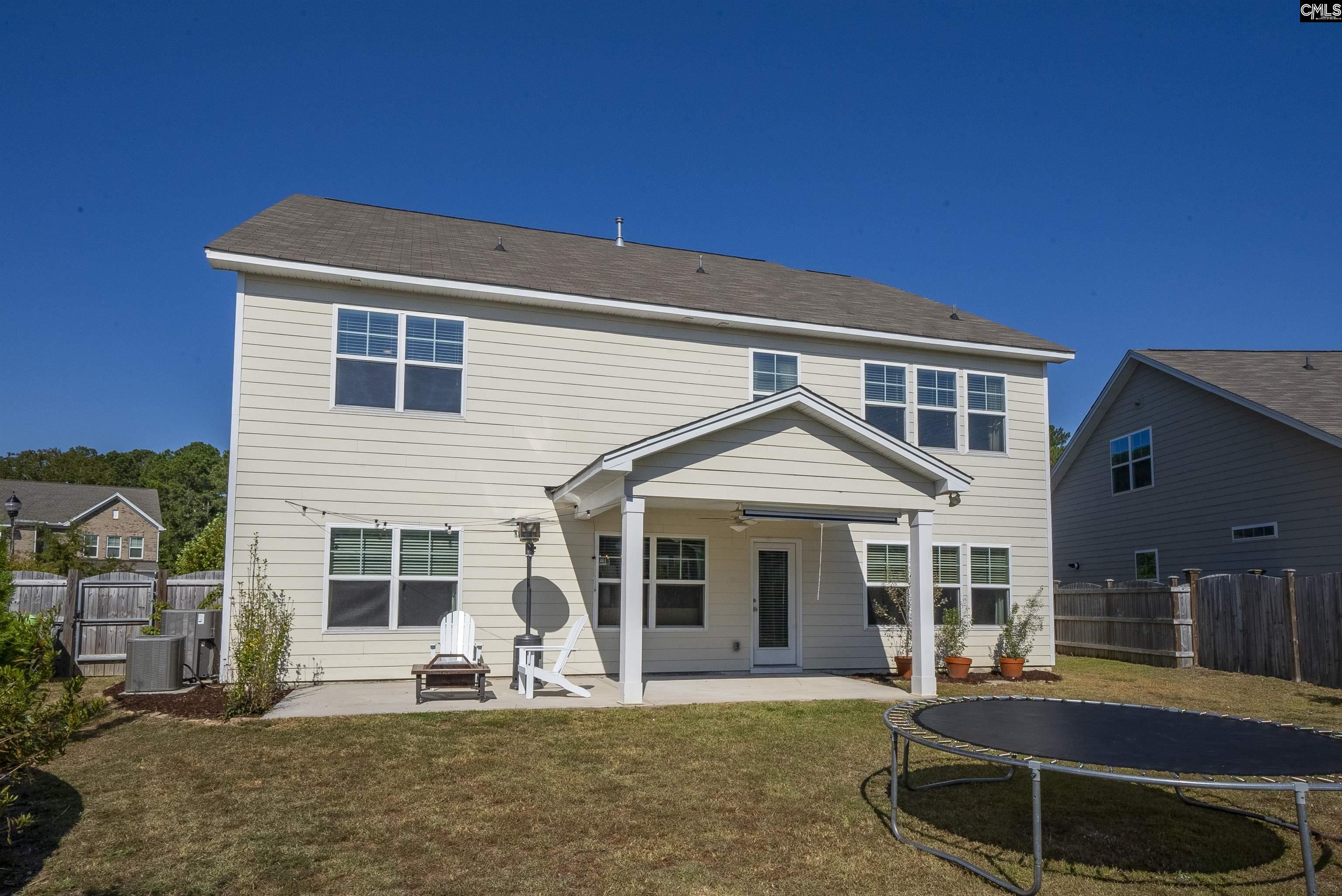 515 Malachite Lane Chapin, SC 29036 - Photo 52 of 63 a front view of a house with a yard