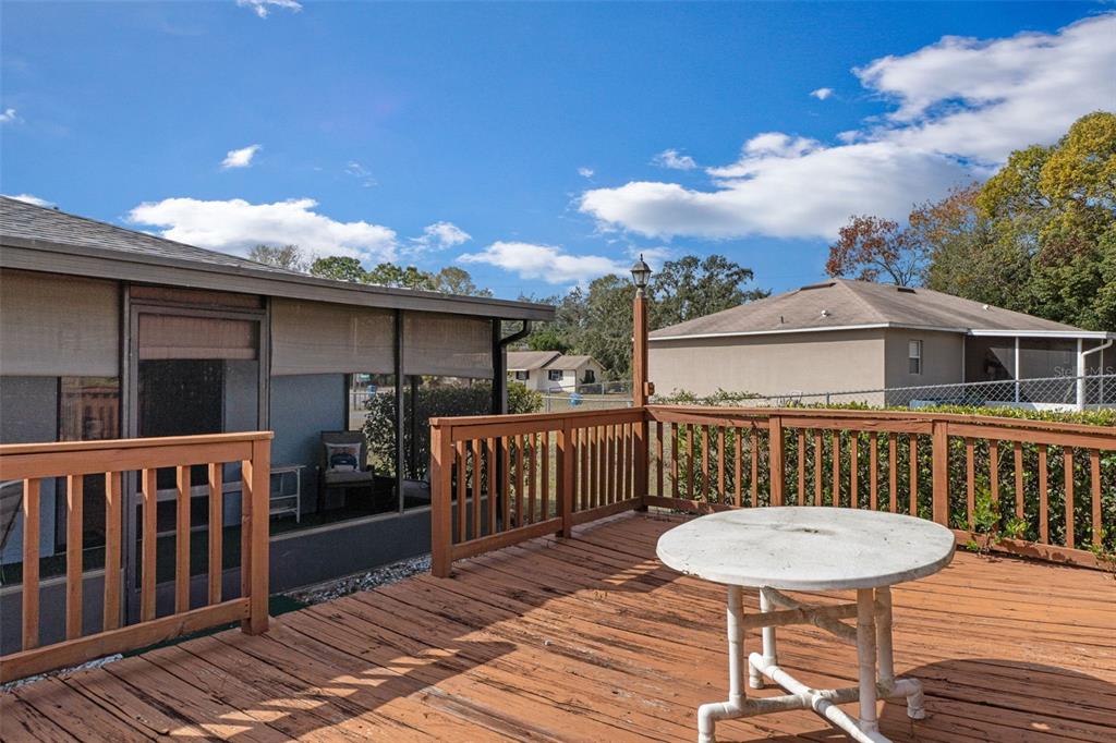 2300 Restmere Lane Spring Hill, FL 34609 - Photo 22 of 28 a view of a deck with furniture